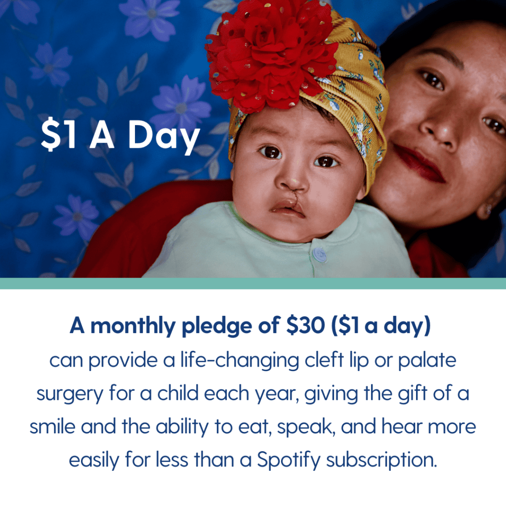 A baby with a cleft lip and palate, wearing a colorful hat, sits on a woman’s lap. Text explains how $1 a day can fund cleft lip and palate surgery, improving a child’s life for less than a Spotify subscription.