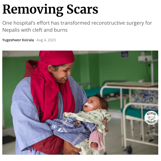 A smiling woman in a red headscarf holds a baby with a cleft lip, both inside a hospital room with green walls and medical beds—an intimate scene captured for a reconstructive surgery Nepal documentary film.